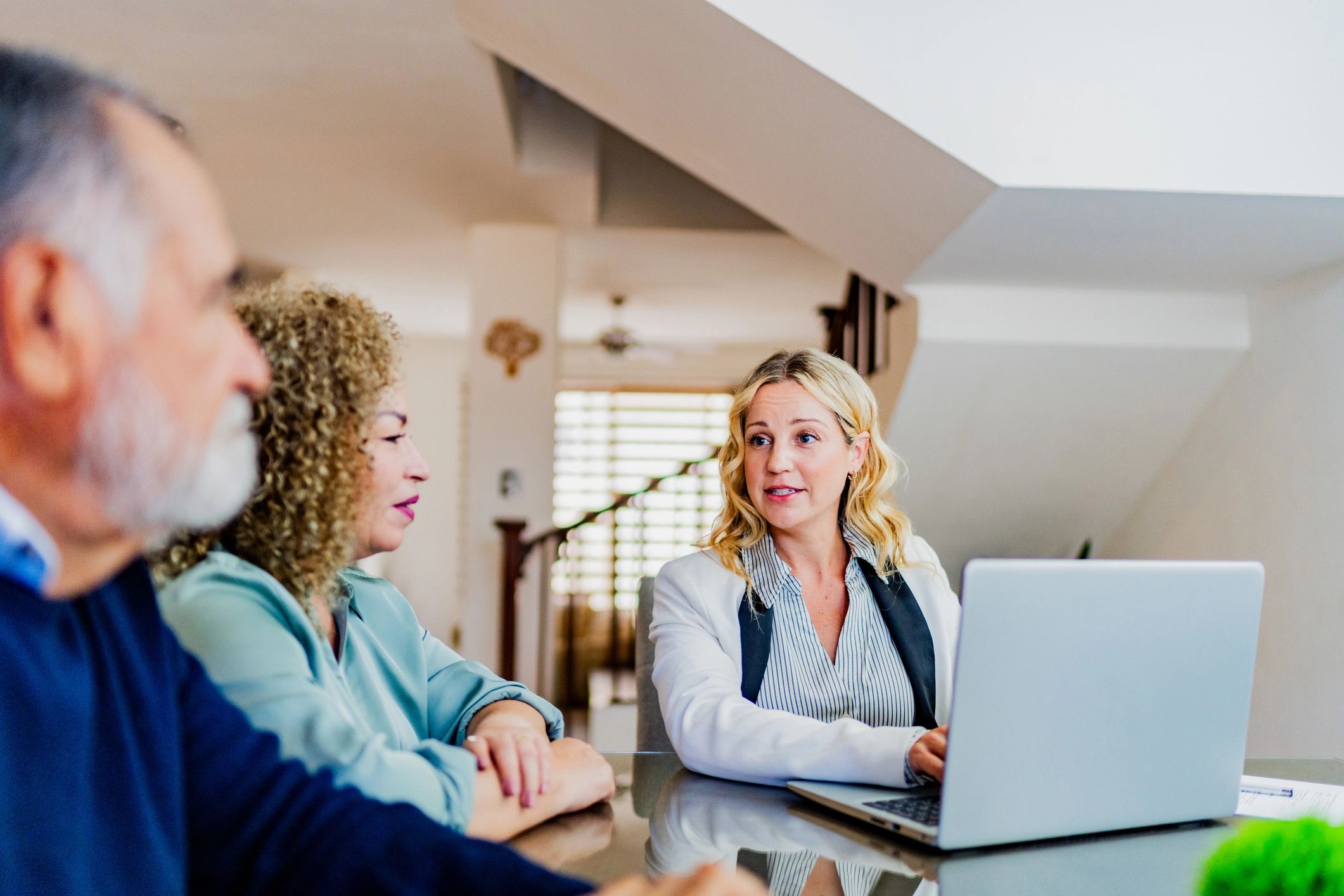 Mortgage consultation meeting at a table