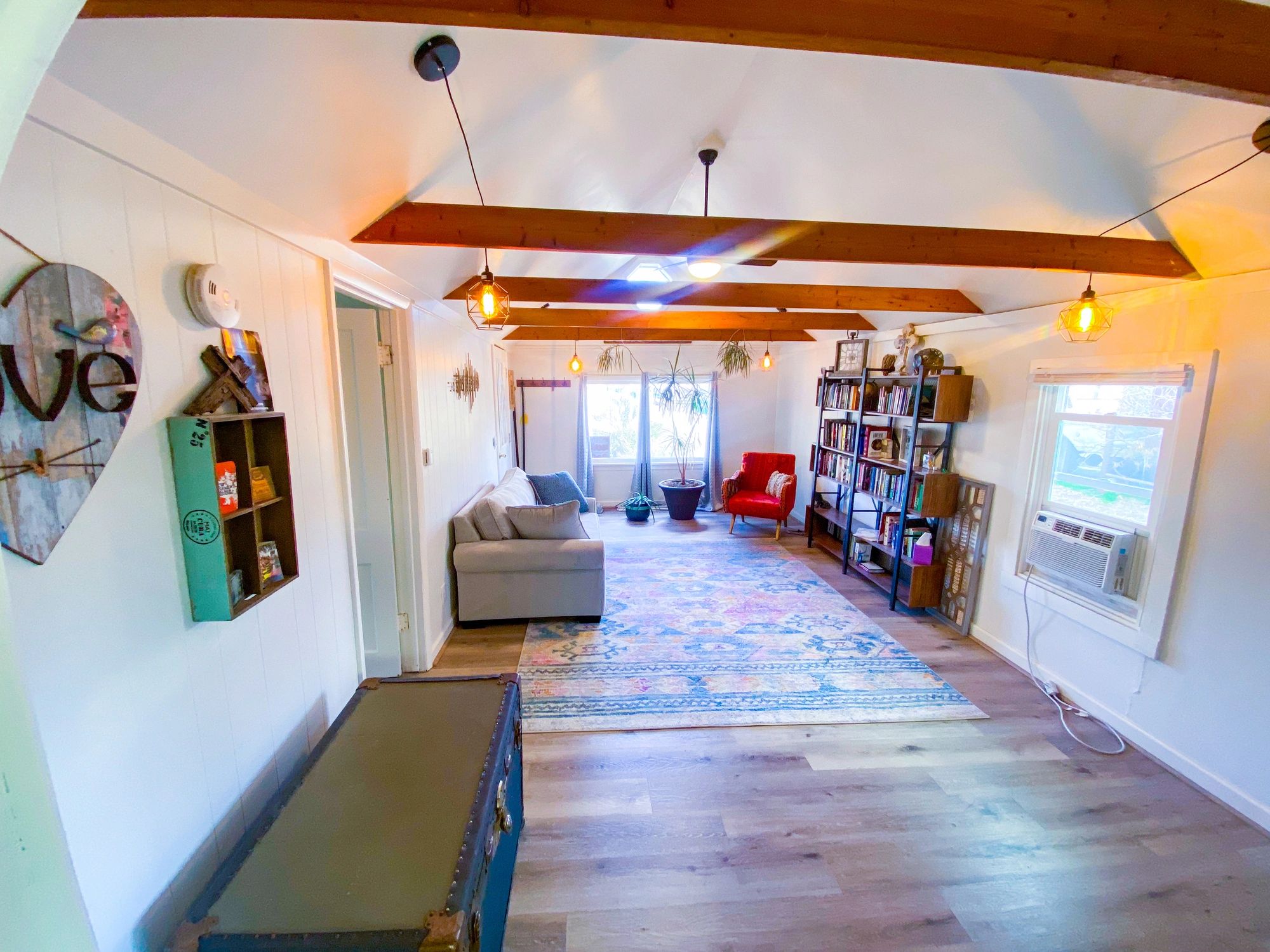 Bright living room interior with exposed beams